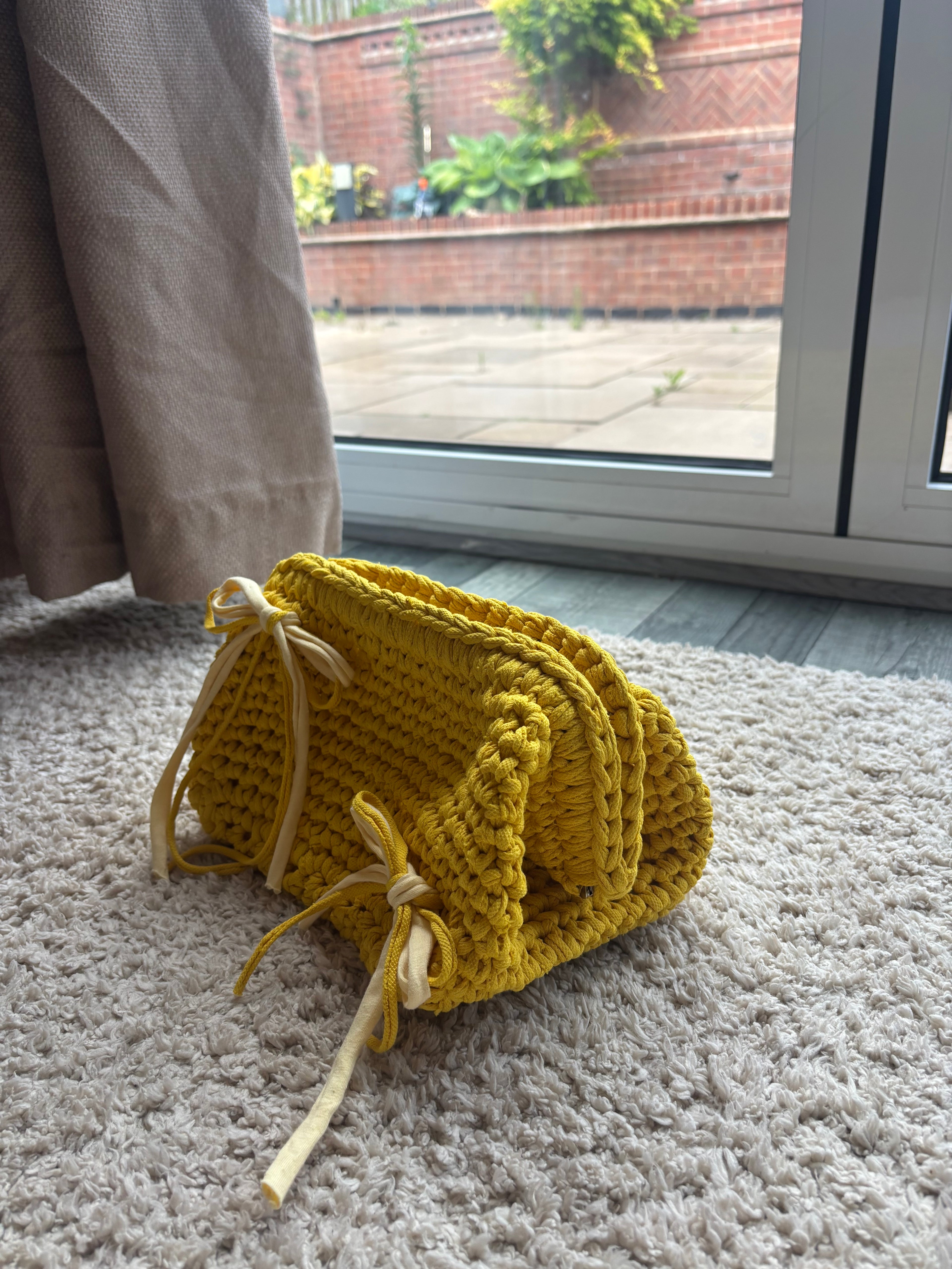 Buttercup clutch bag