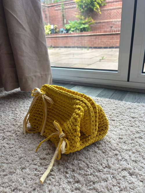 Buttercup clutch bag