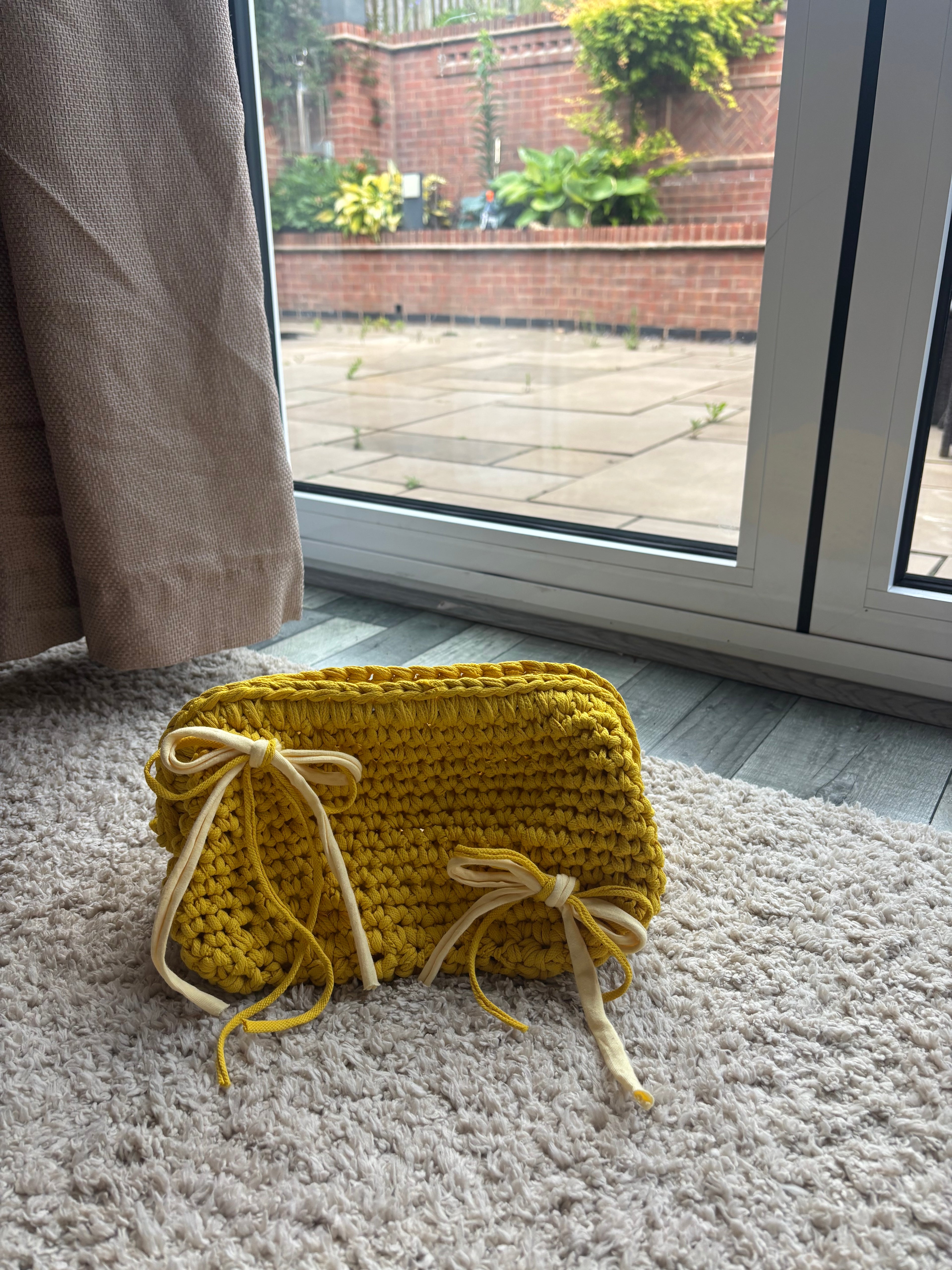 Buttercup clutch bag