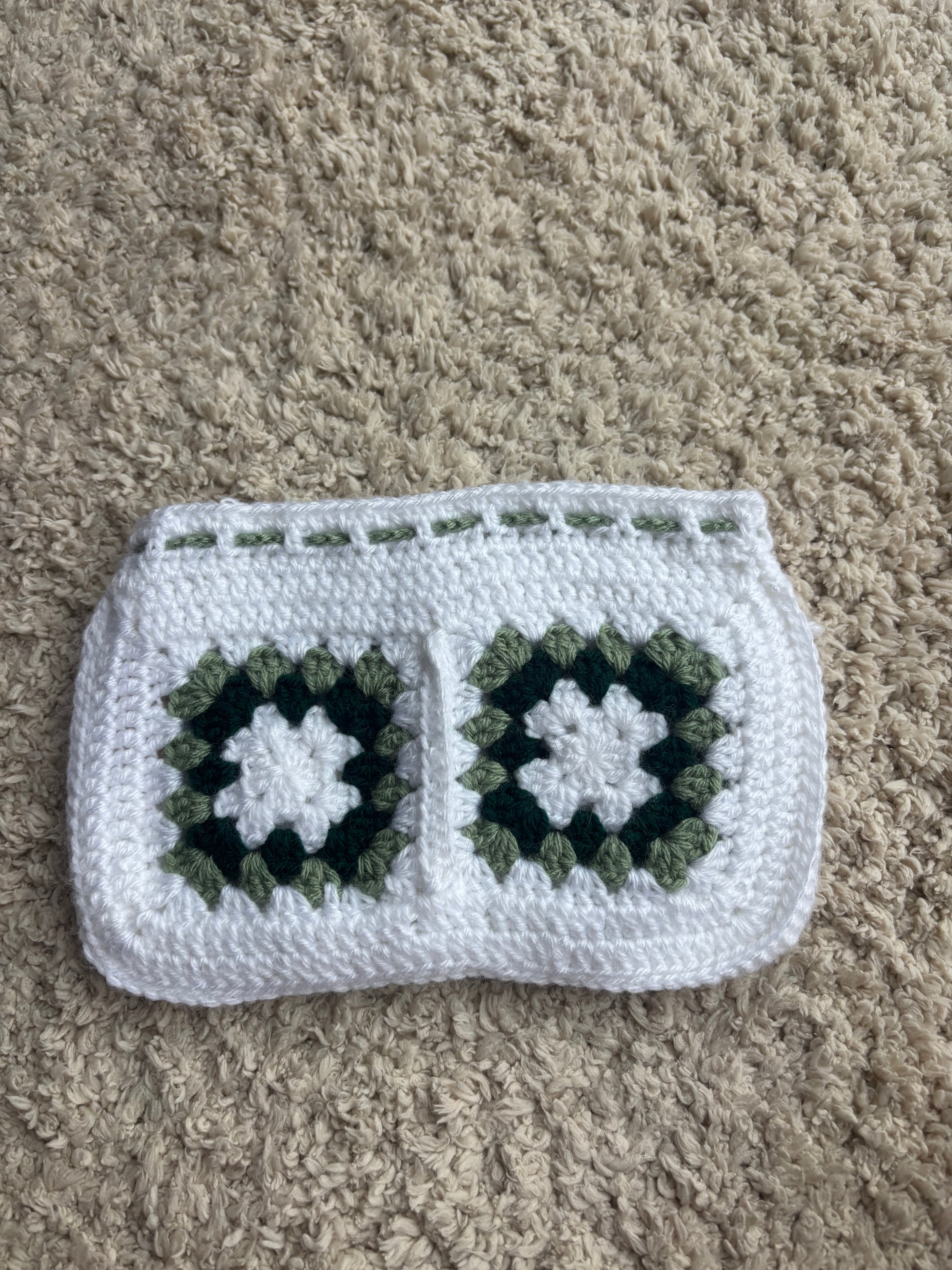 Green and white granny square book sleeve