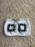 Green and white granny square book sleeve