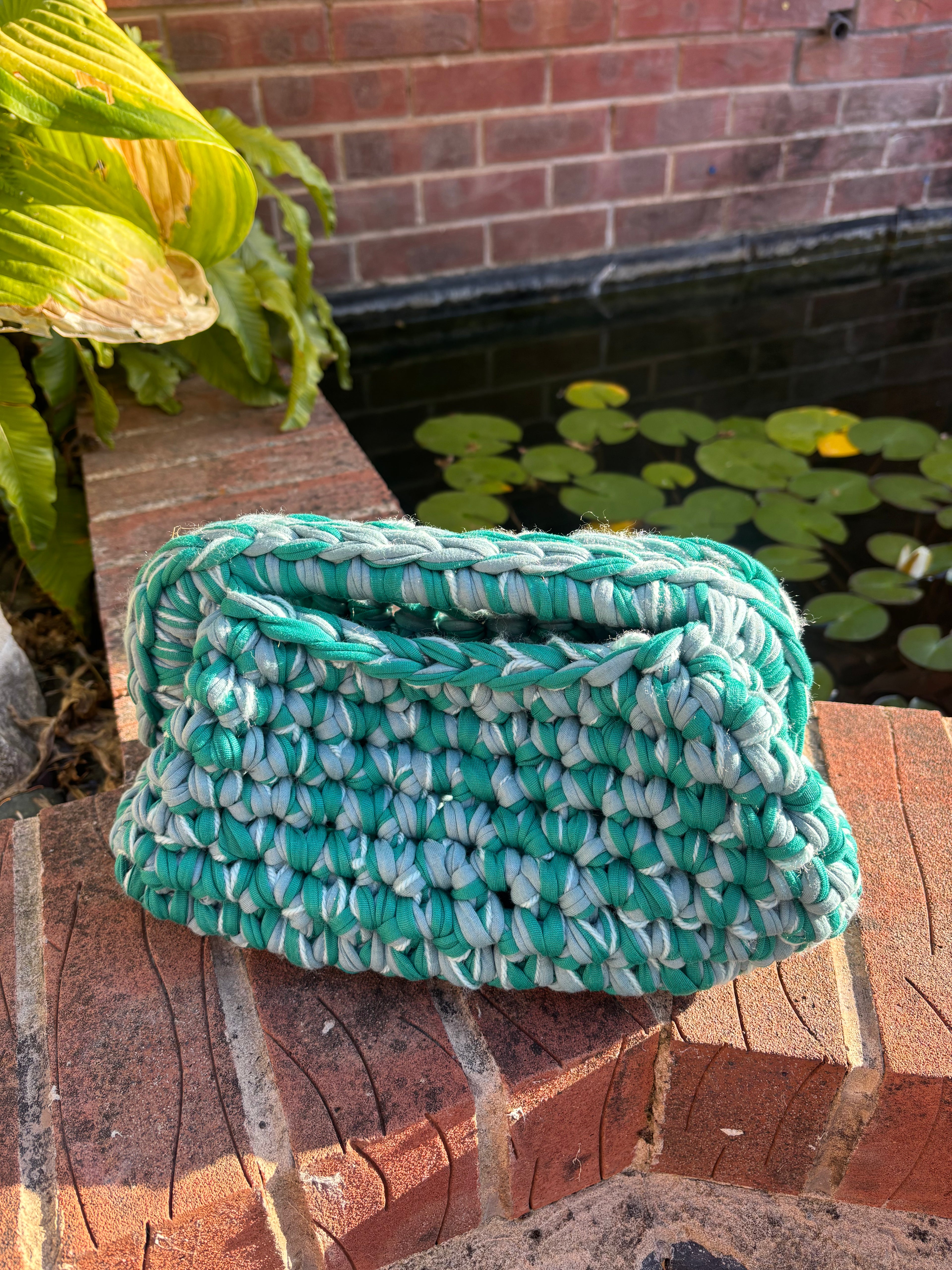 Deep sea clutch bag